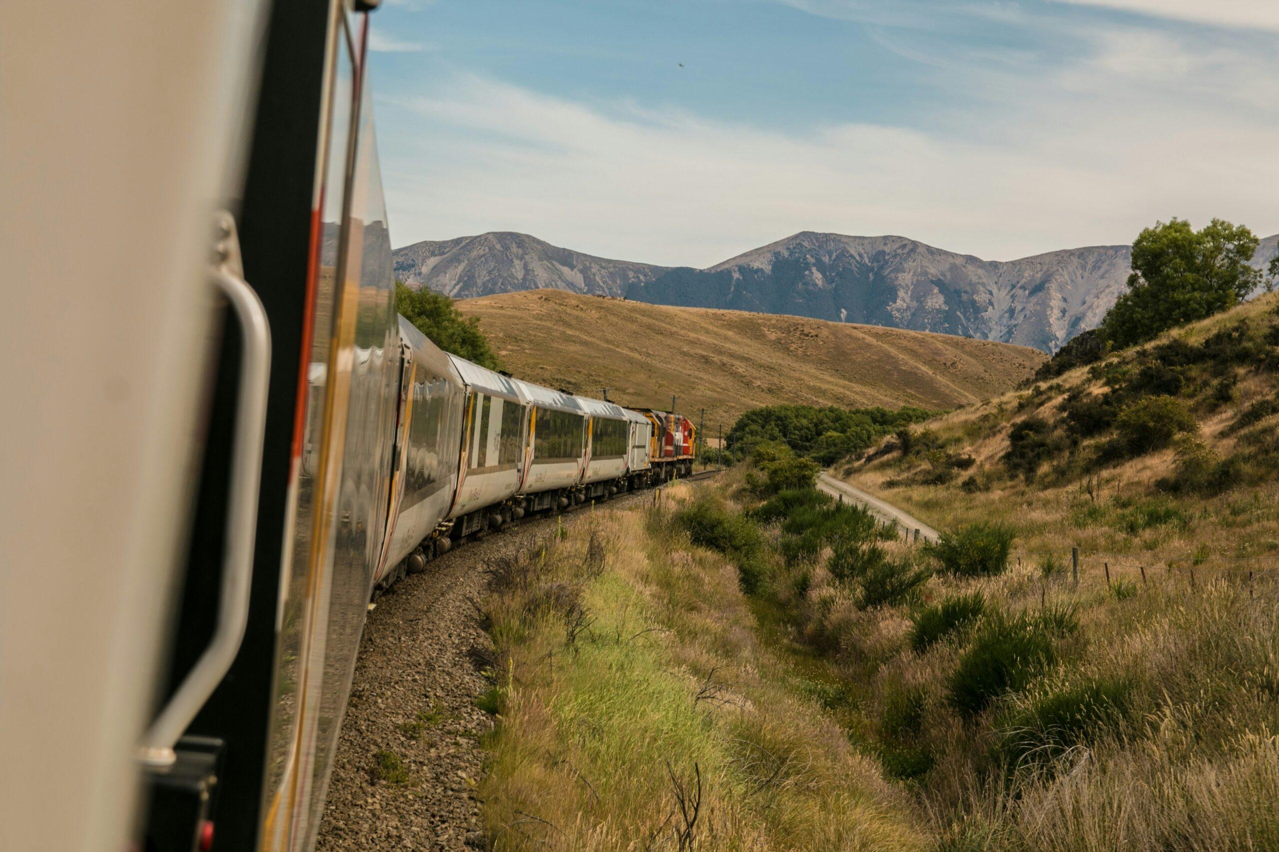 The red Bernina Express on the circular Brusio Viaduct in the Swiss canton of Graubünden in autumn