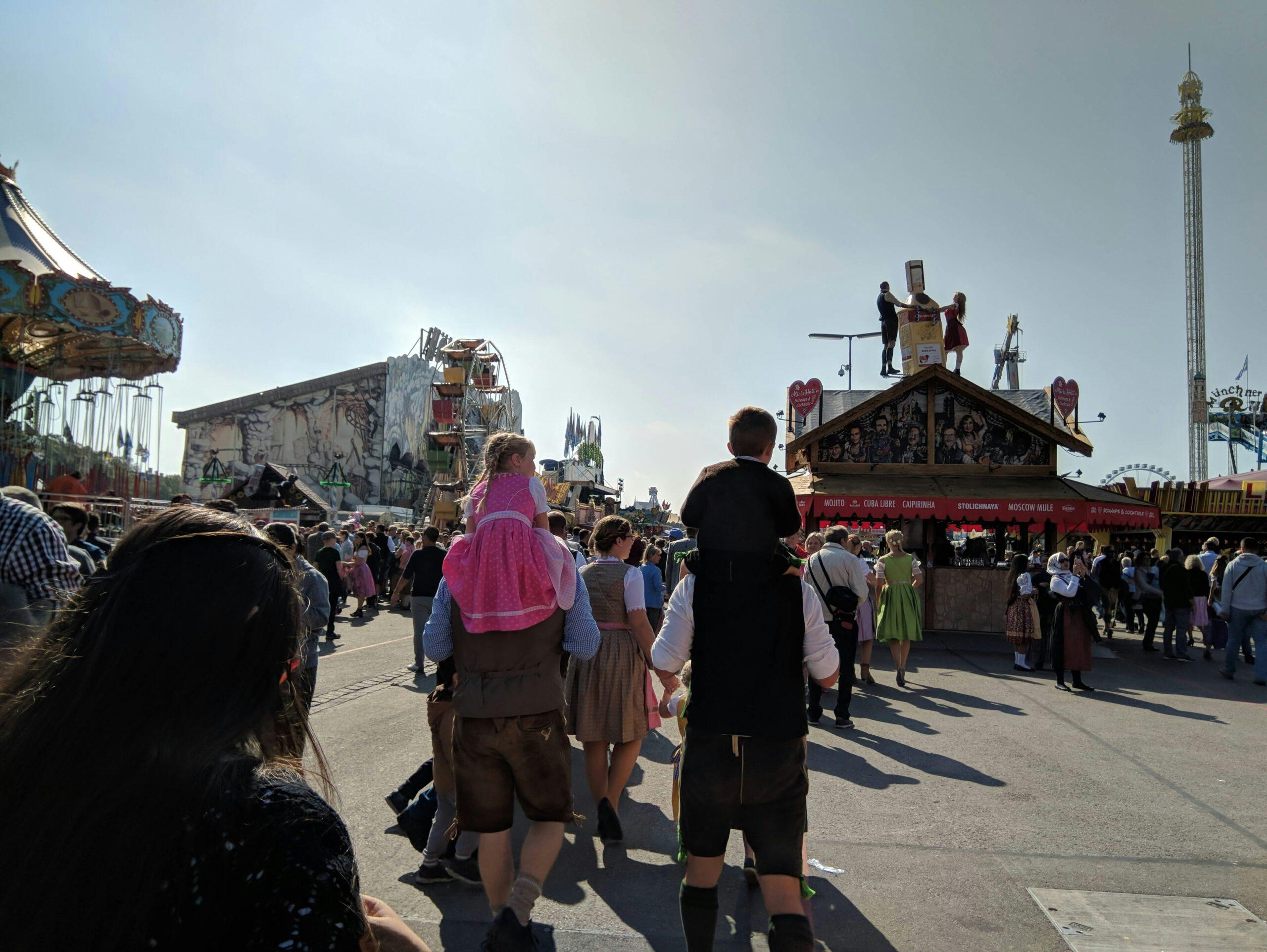 Festive Oktoberfest tents in Munich with beer steins and traditional Bavarian costumes